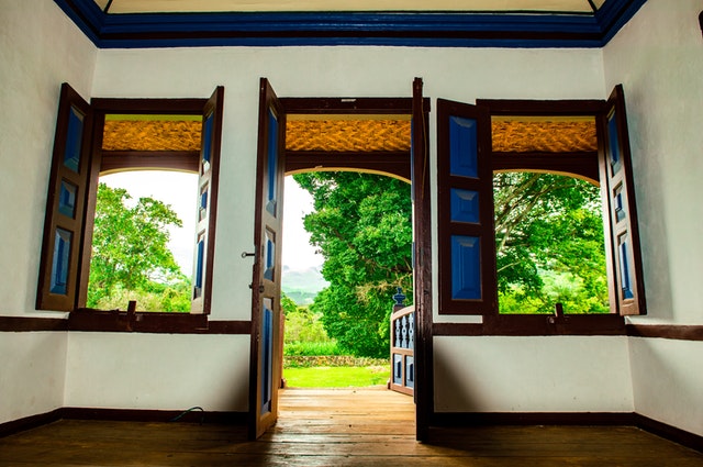 an old home with wooden windows