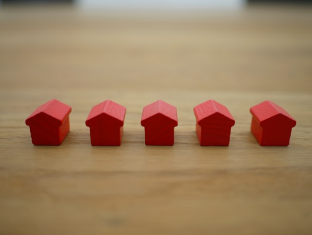 Small red houses used for playing Monopoly