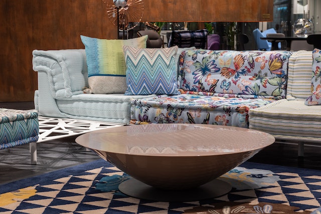 A sofa made of multiple colour patterns which is trendy, but following trends too much is one of the colour mistakes to avoid in your home décor