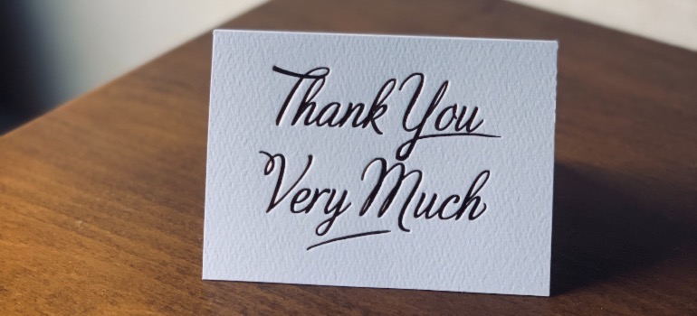 A thank you card on a table