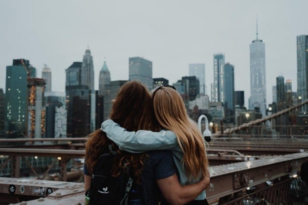 A couple enjoying the view of the New York City skyline